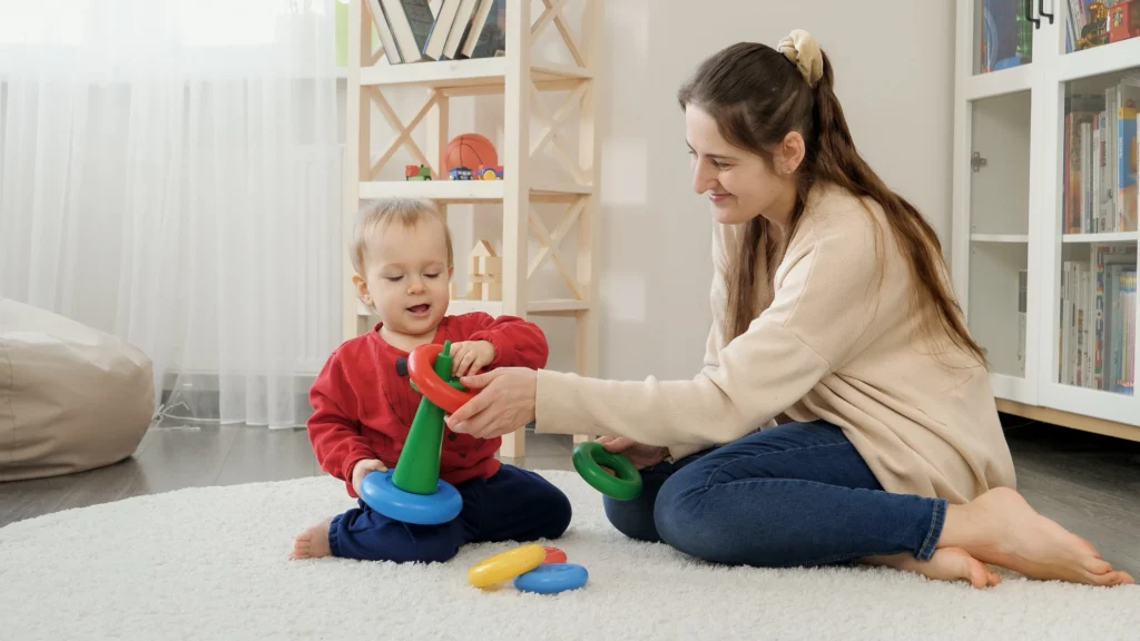 A Certified Nanny professional playing with a Child.