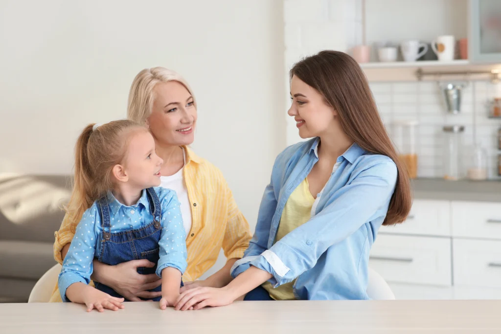 A nanny professional interacting with the child.