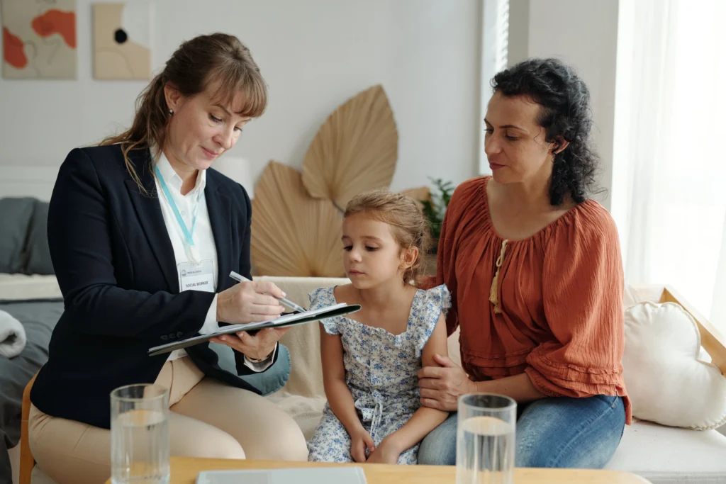  A woman Prepairing a nanny contract with the help of female lawyer