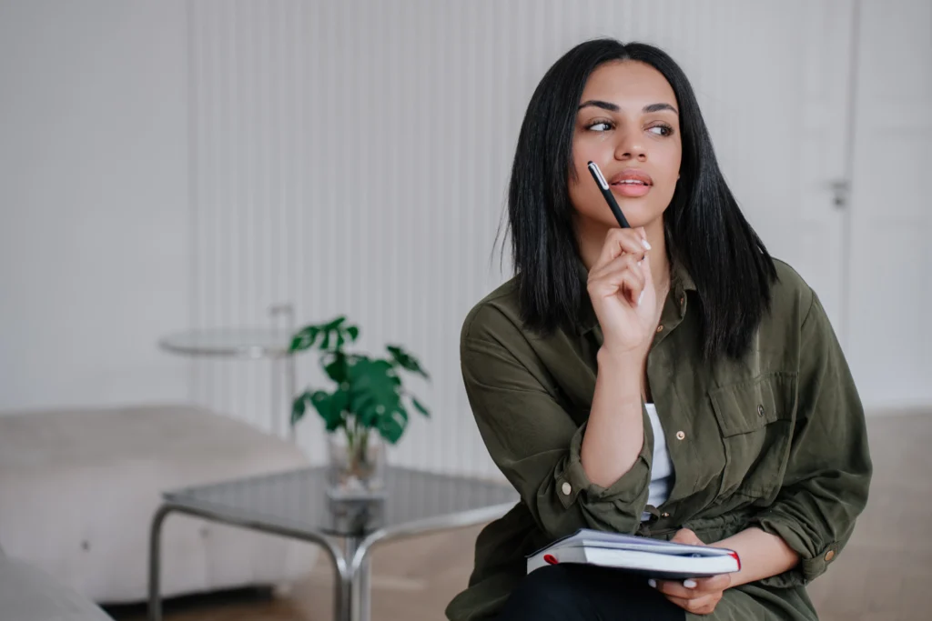 A women prepairing questions ask while finding a nanny